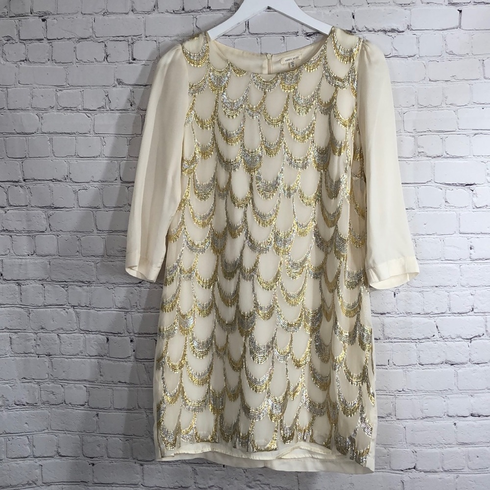 Under skies shimmering dress